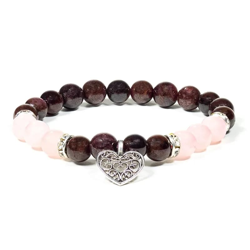 Armband med pärlor av rosenkvarts, granat och hjärtberlock