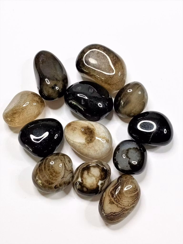 Cuddle stones av svart agat