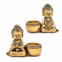 Presentkit med två värmeljushållare - mediterande Buddha & Buddha i bön