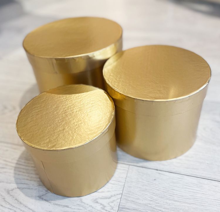 Runda askar guld