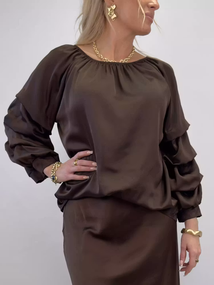 Raya blus brun