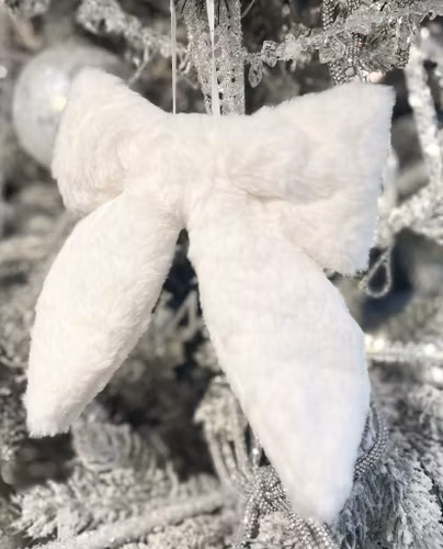 Vit rosett fuskpäls