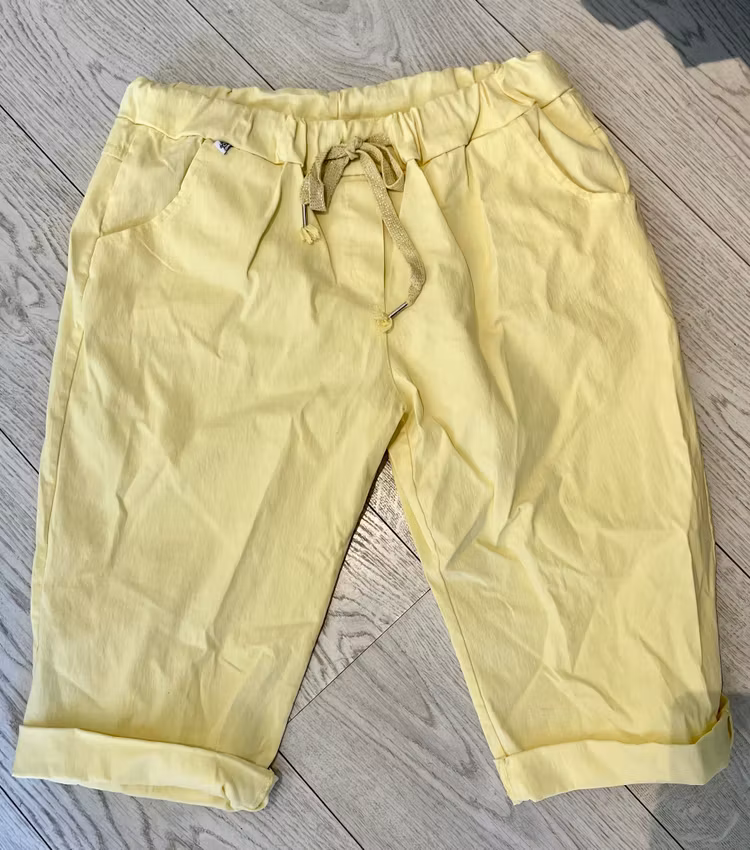 Magiska caprishorts gula