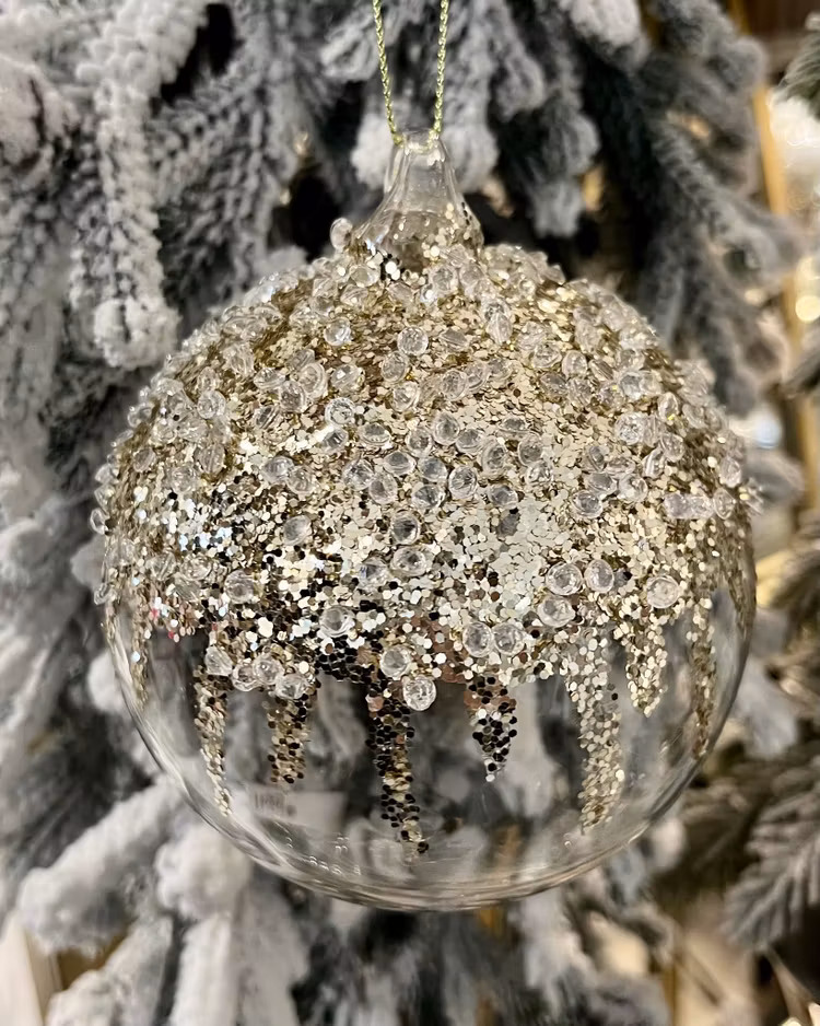Glaskula med guld och glaspärlor