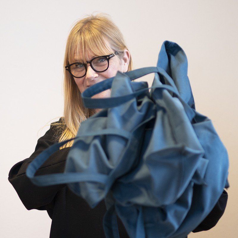 Fabric bags made from scraps of wood