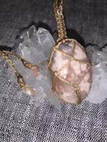 Talisman med blomsteragat och solsten i ändarna