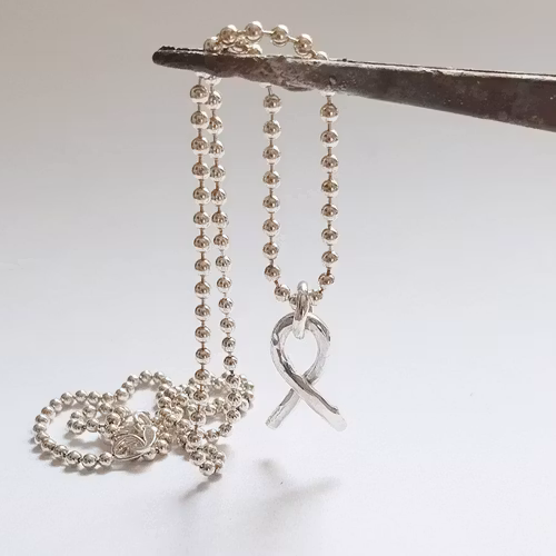 Rosa bandet i äkta silver - halsband - mellan berlock