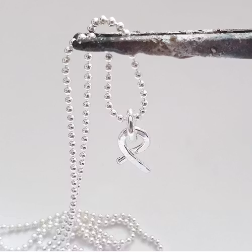 Pink ribbon in sterling silver - small charm