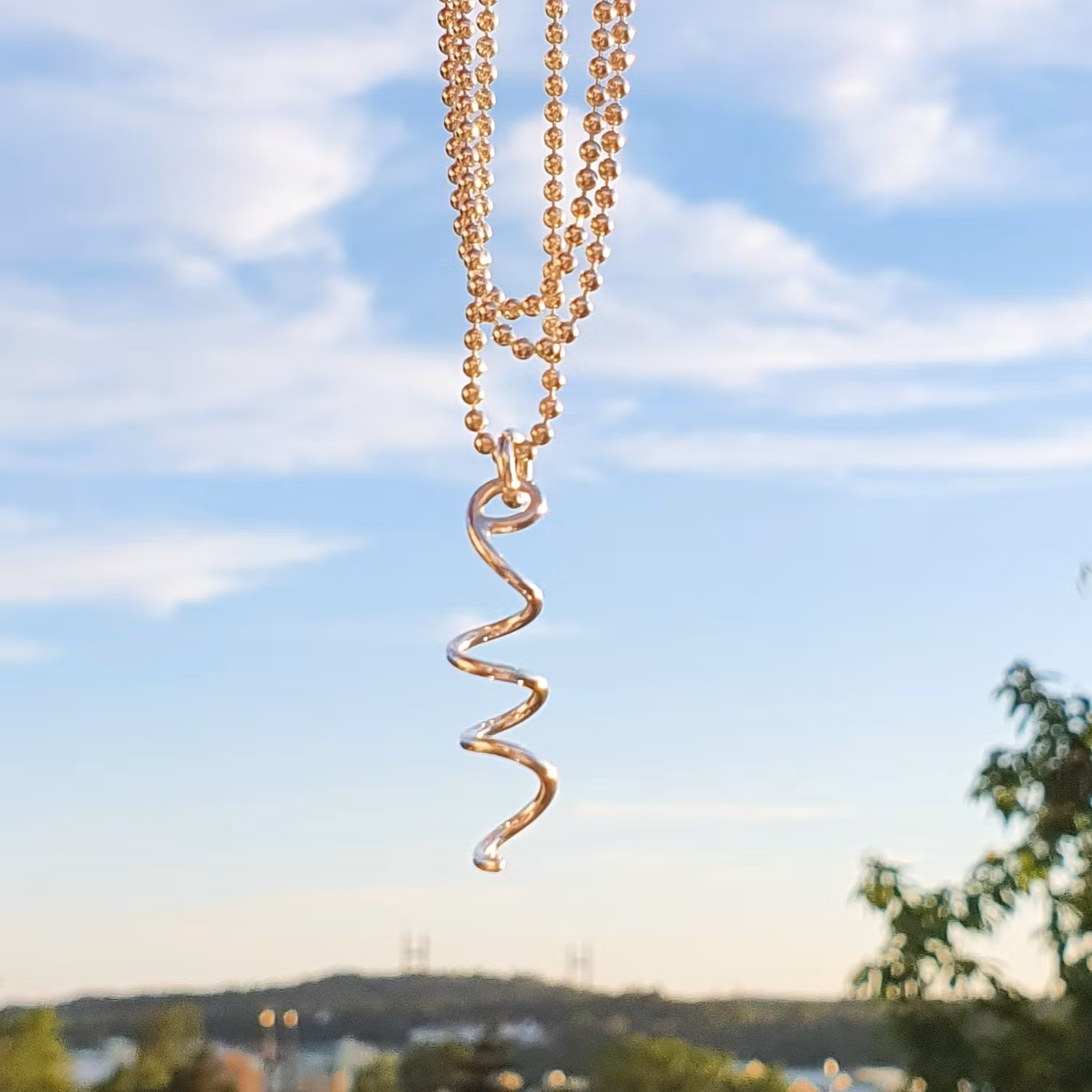Silver necklace with spiral