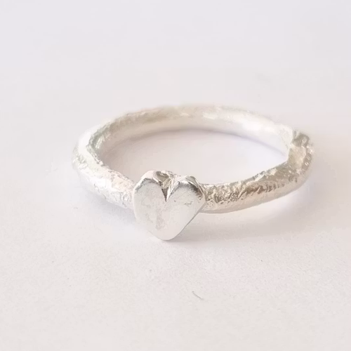 Sparkling and raw heart ring in sterling silver with silver heart