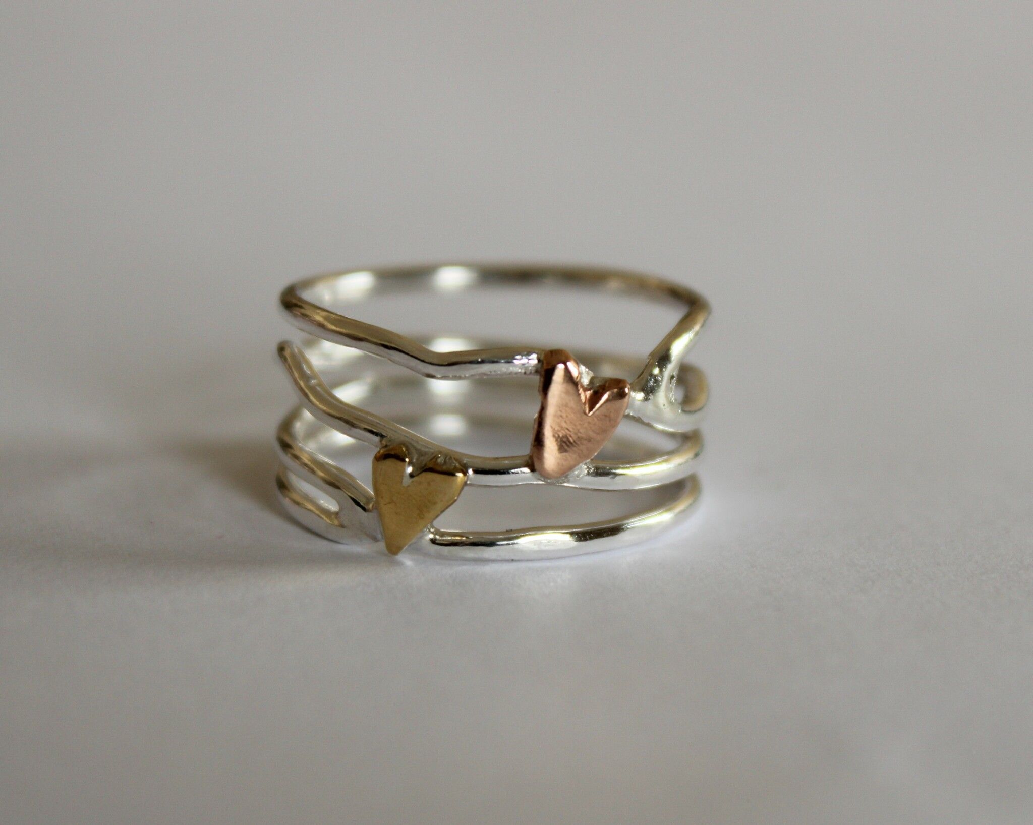 Airy heart ring with brass and bronze heart