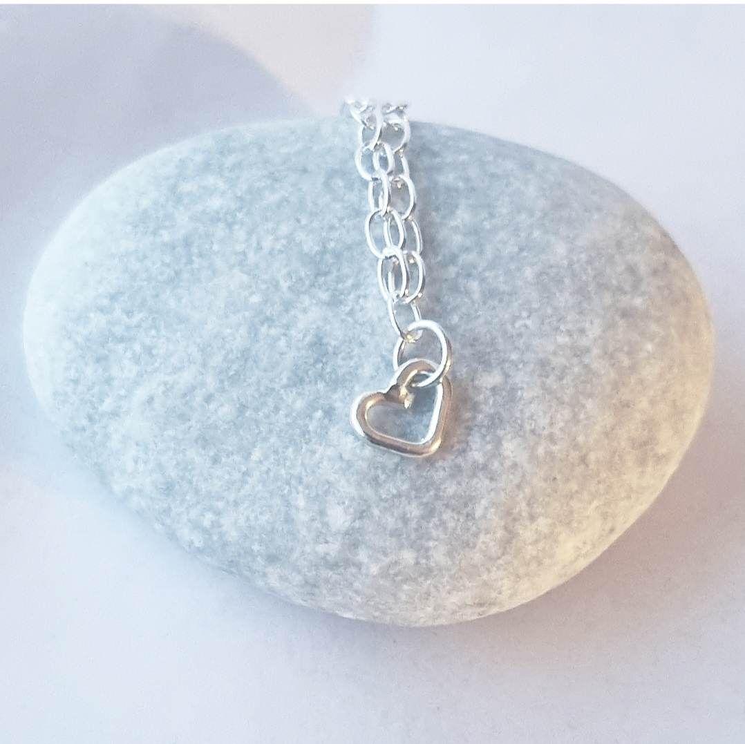Silverarmband med hjärtansberlock