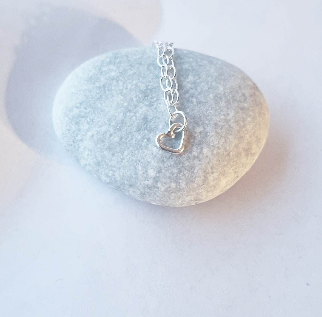 Silverarmband med hjärtansberlock
