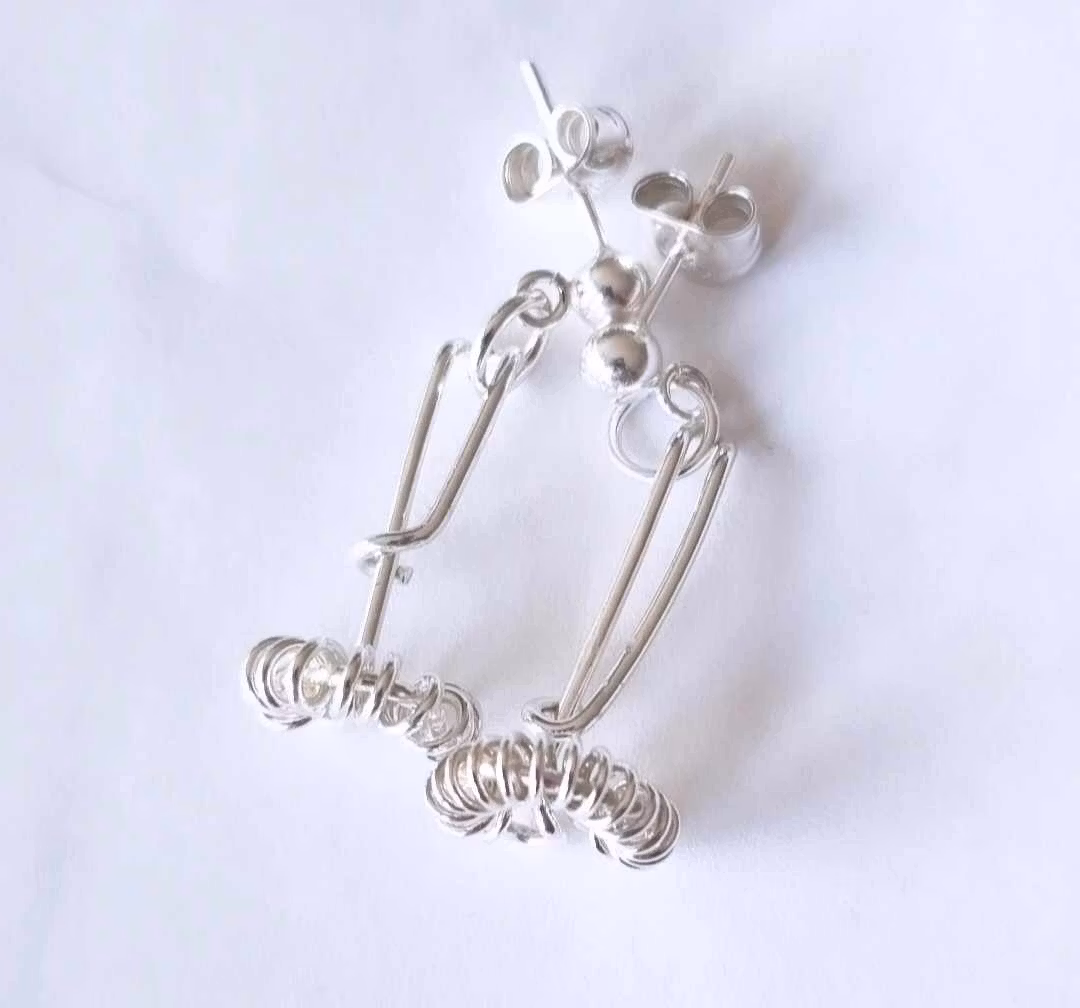 Small silver whisk earring