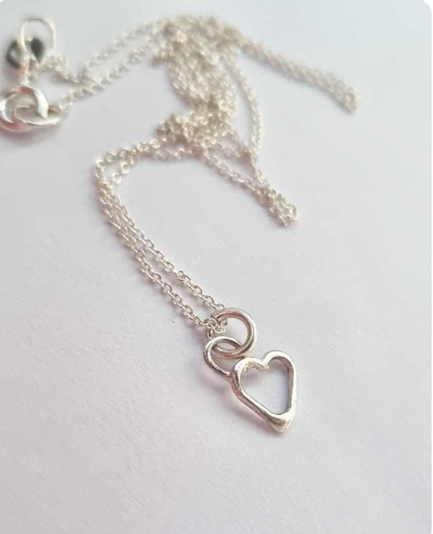 Tiny heart hand-forged in genuine silver, necklace