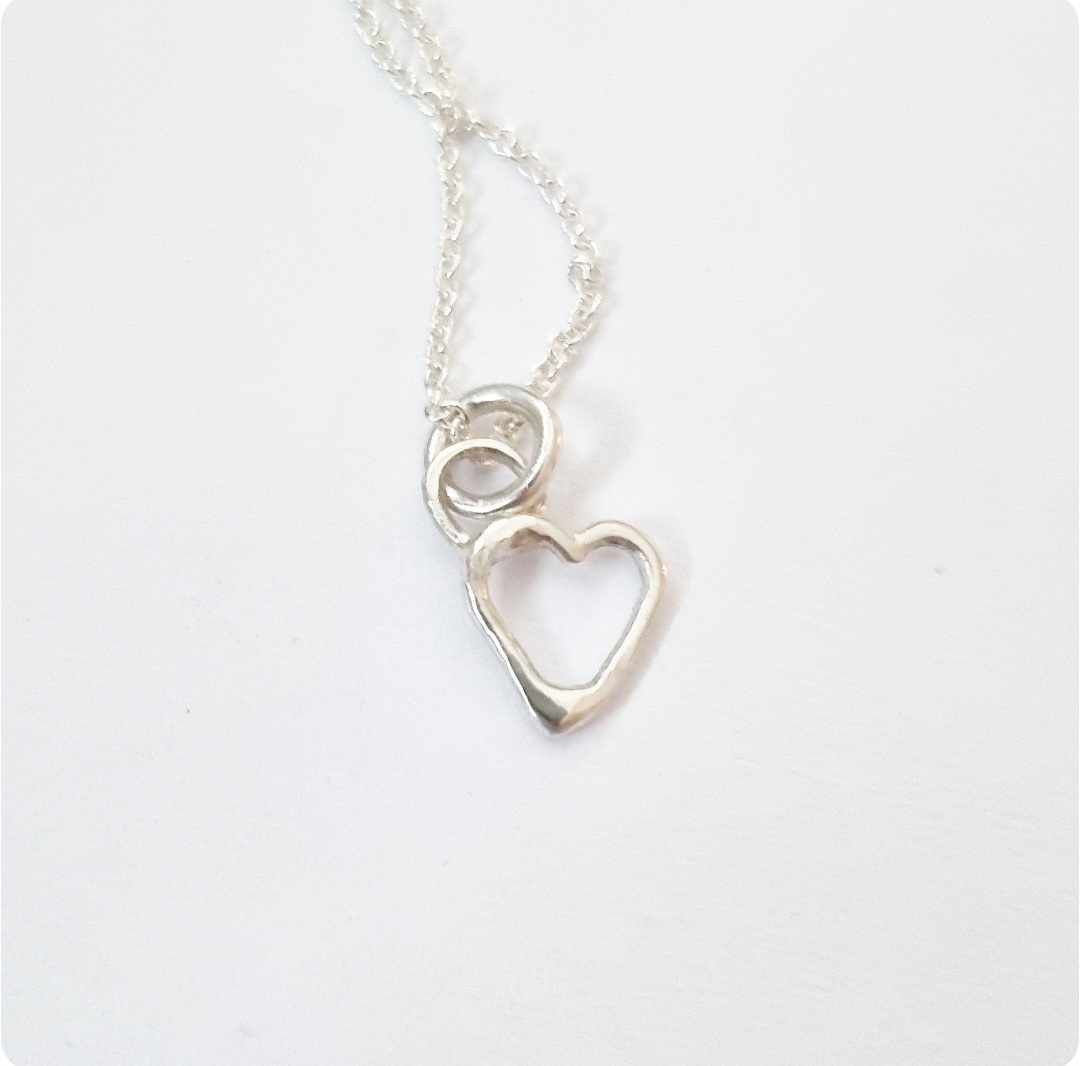 Tiny heart hand-forged in genuine silver, necklace