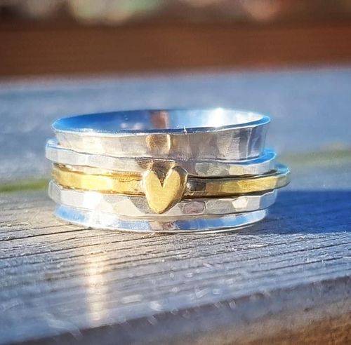 Snurring - spinningring i äkta silver med mässinghjärta