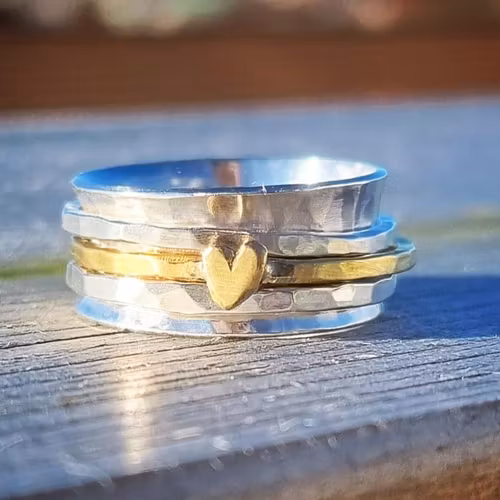 Snurring - spinningring i äkta silver med mässinghjärta
