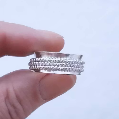 Snurring - spinningring i äkta silver med tre kulringar
