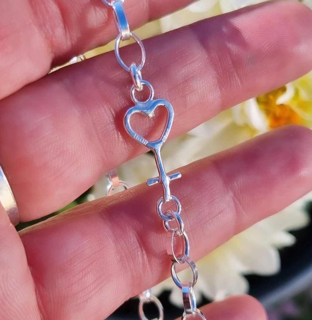 Silverarmband med kvinnomärke - hjärtat