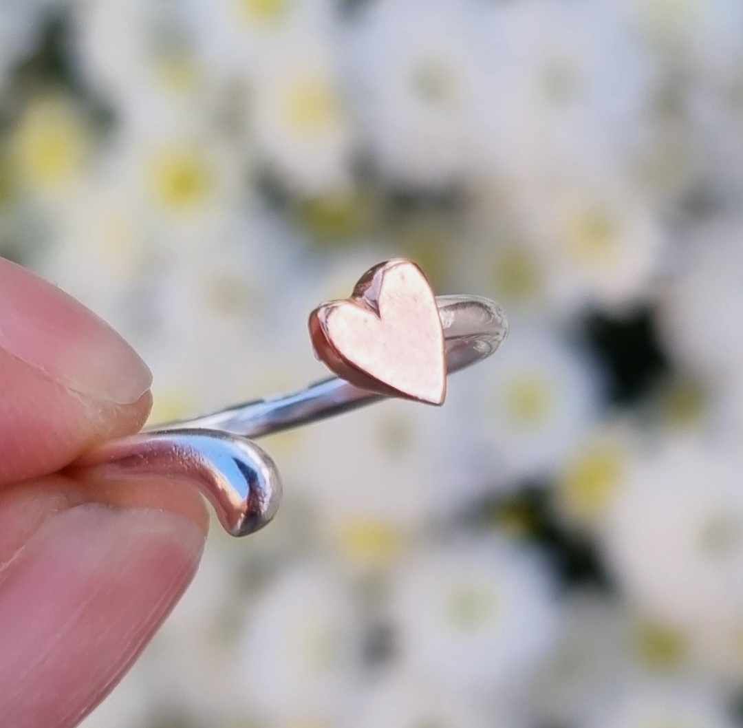 Open heart ring in sterling silver with hand-sawn heart in bronze Happy Heart