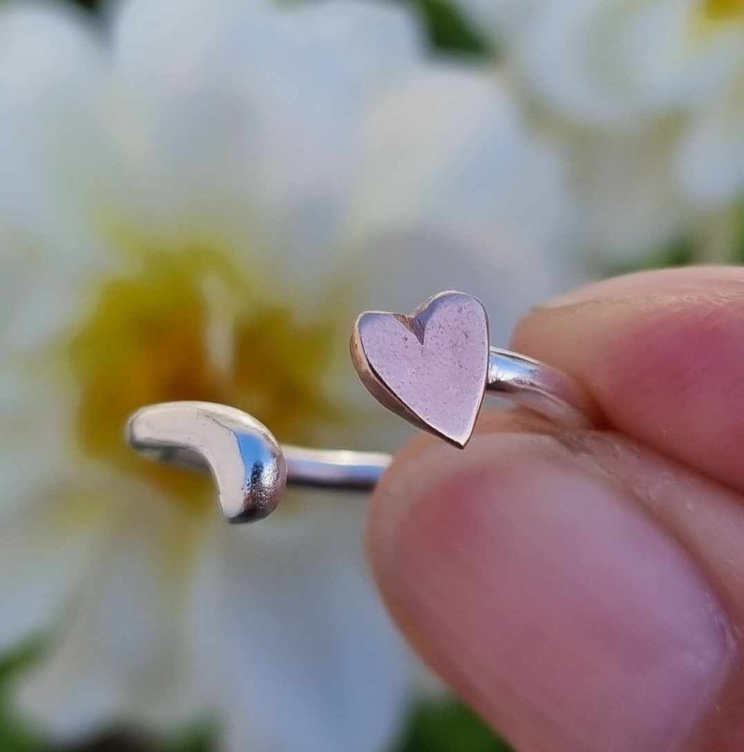 Open heart ring in sterling silver with hand-sawn heart in bronze Happy Heart