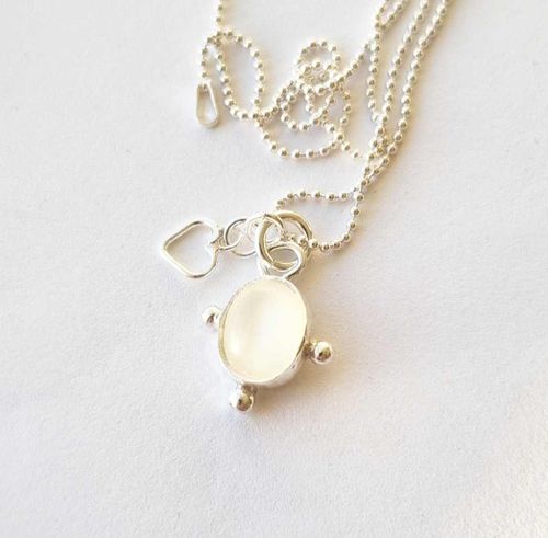 White moonstone set in sterling silver necklace