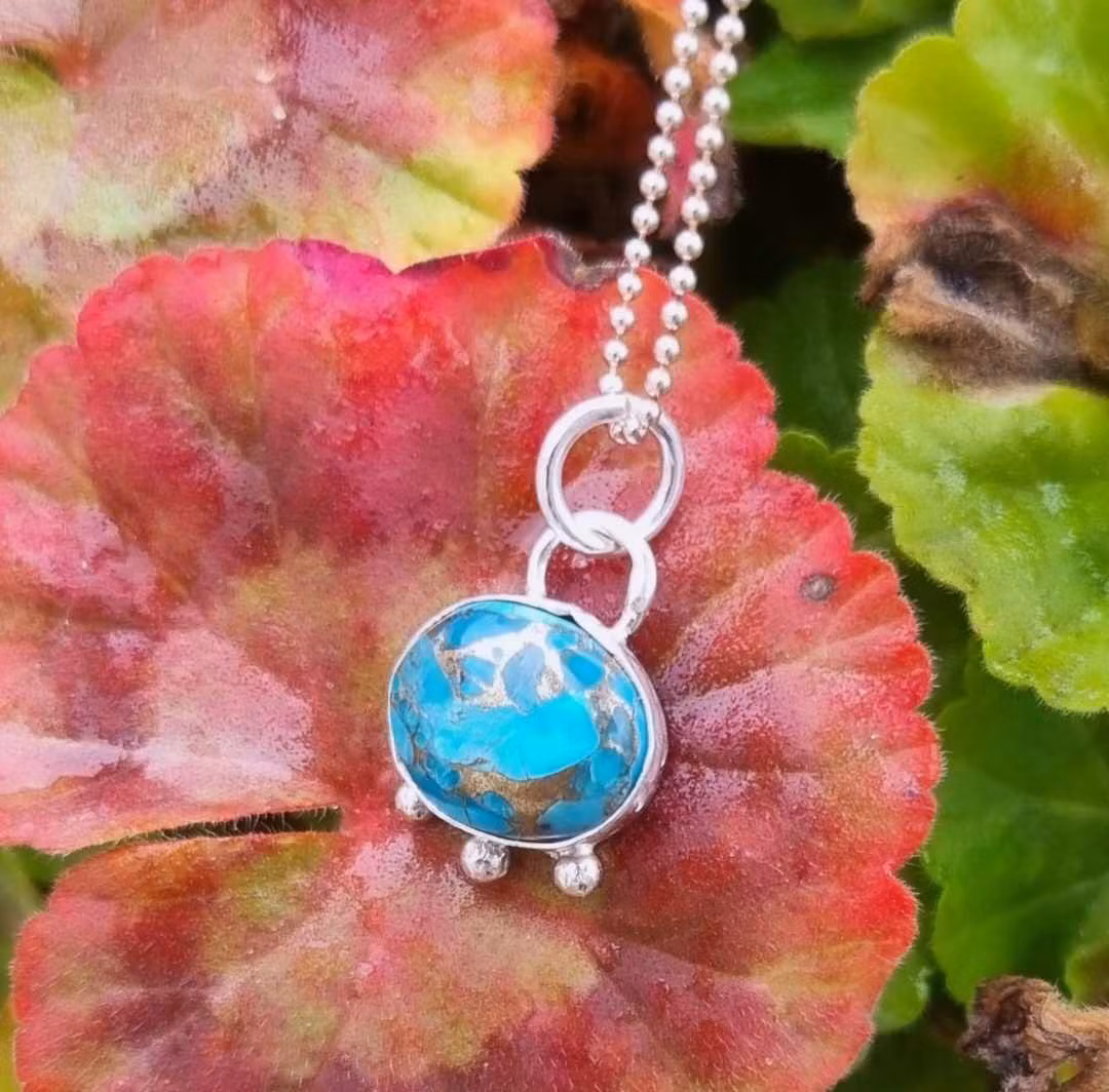 Fine turquoise stone set in genuine silver charm Boho style