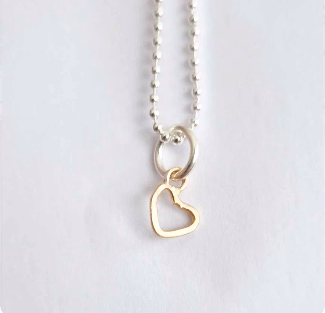 Sweetheart a small and beautiful hand-forged gold heart in genuine 18k gold