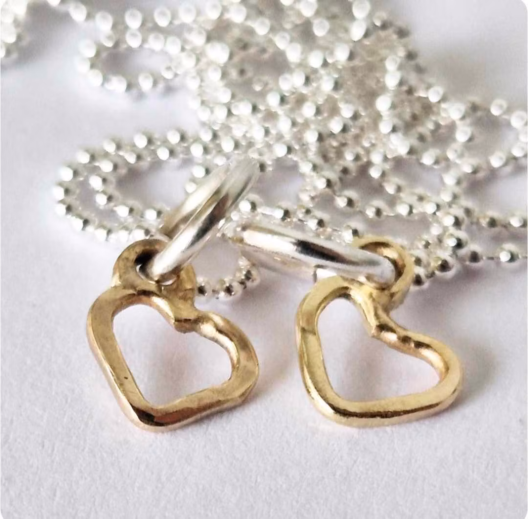 Sweetheart a small and beautiful hand-forged gold heart in genuine 18k gold