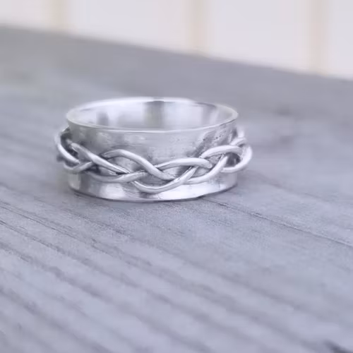 Harmoni - Snurring med silverfläta handgjord i äkta silver