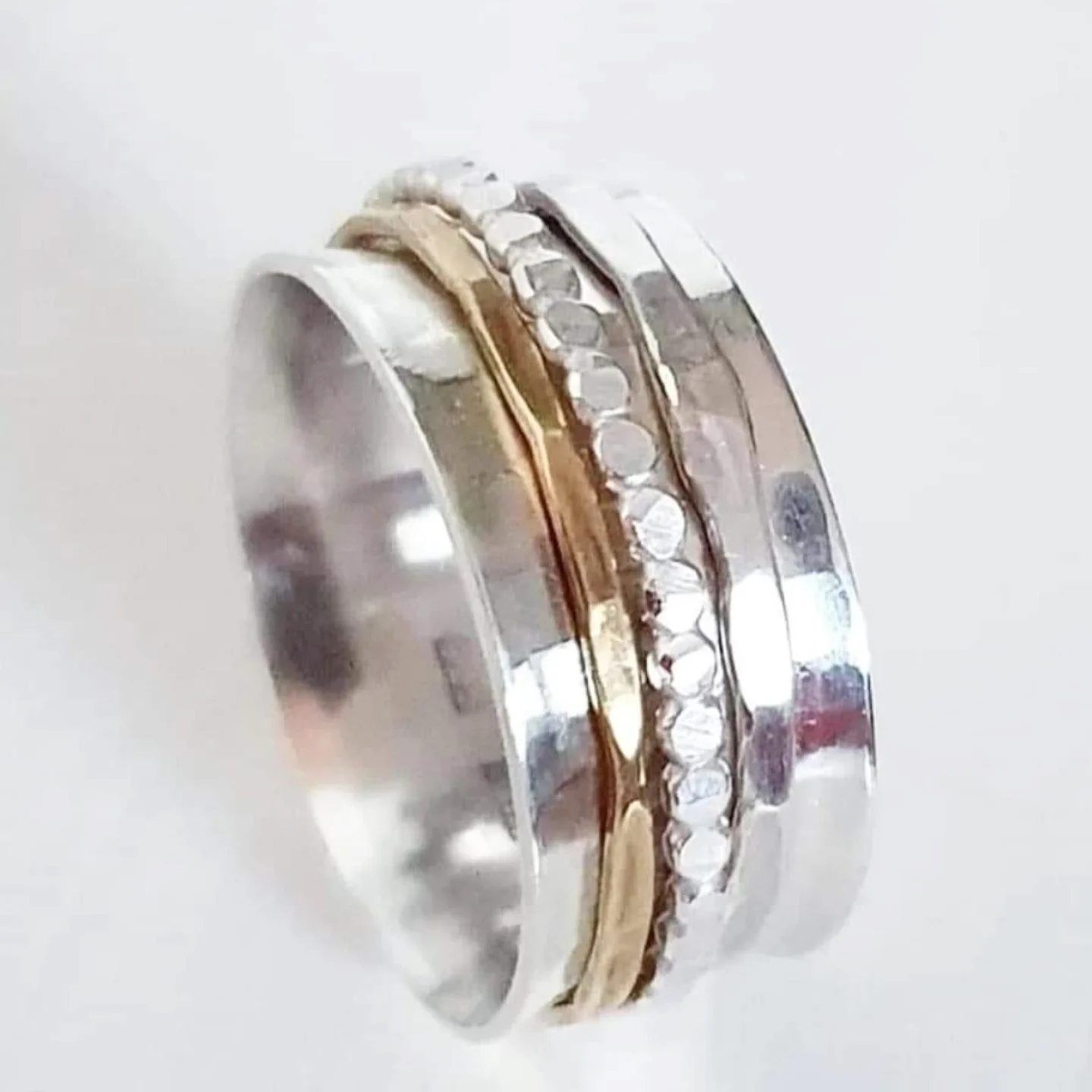 Snurring - spinningring i äkta silver med kulring, silver och mässingring