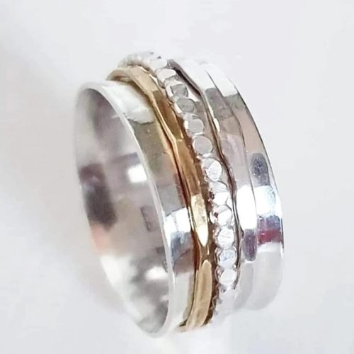 Snurring - spinningring i äkta silver med kulring, silver och mässingring