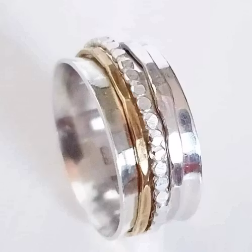 Snurring - spinningring i äkta silver med kulring, silver och mässingring