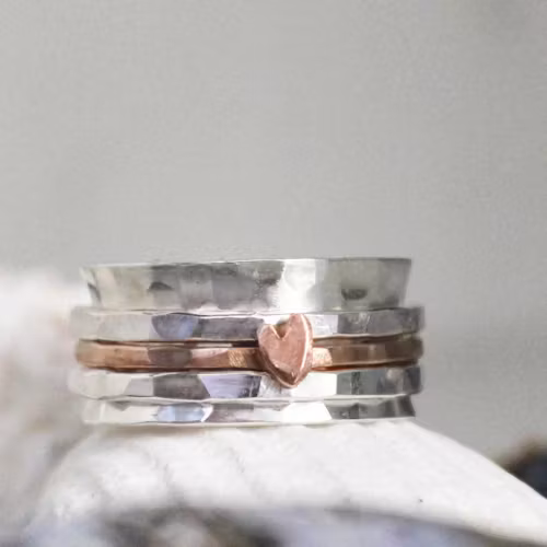 Snurring - spinningring i äkta silver med bronshjärta på bronsring