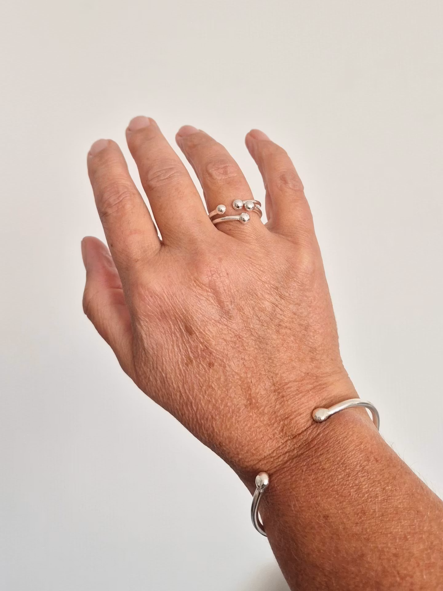 Cosmos de luxe bangle stelt silverarmband