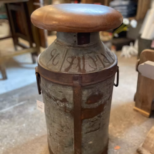 Barstool milk jug with leather seat