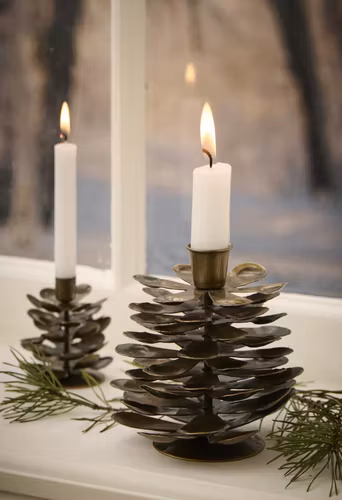 Ljustake kotte i metall