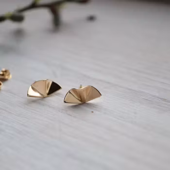 "Stråle" örhängen i rött guld