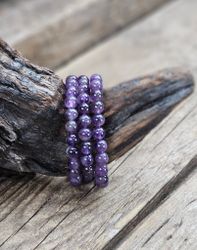 Ametist, armband 8mm runda pärlor -30% fyndexemplar med rökiga inslag