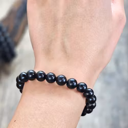 Jet (Fossilerad kolmineral), armband 8mm runda pärlor -30% fyndexemplar trasig pärla