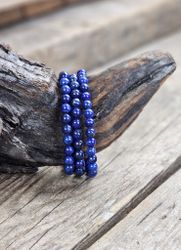 Lapis Lazuli, armband 8mm runda pärlor -30% fyndexemplar svagare färg/B-kvalité samt mindre pärlor