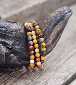 Mookaitjaspis, armband 6mm runda pärlor -30% fynd dålig tråd