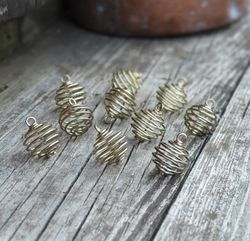 Liten spiralbur för stenar, guld -20% fynd - mörka!