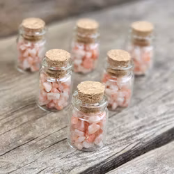 Solsten, kristallchips i glasflaska