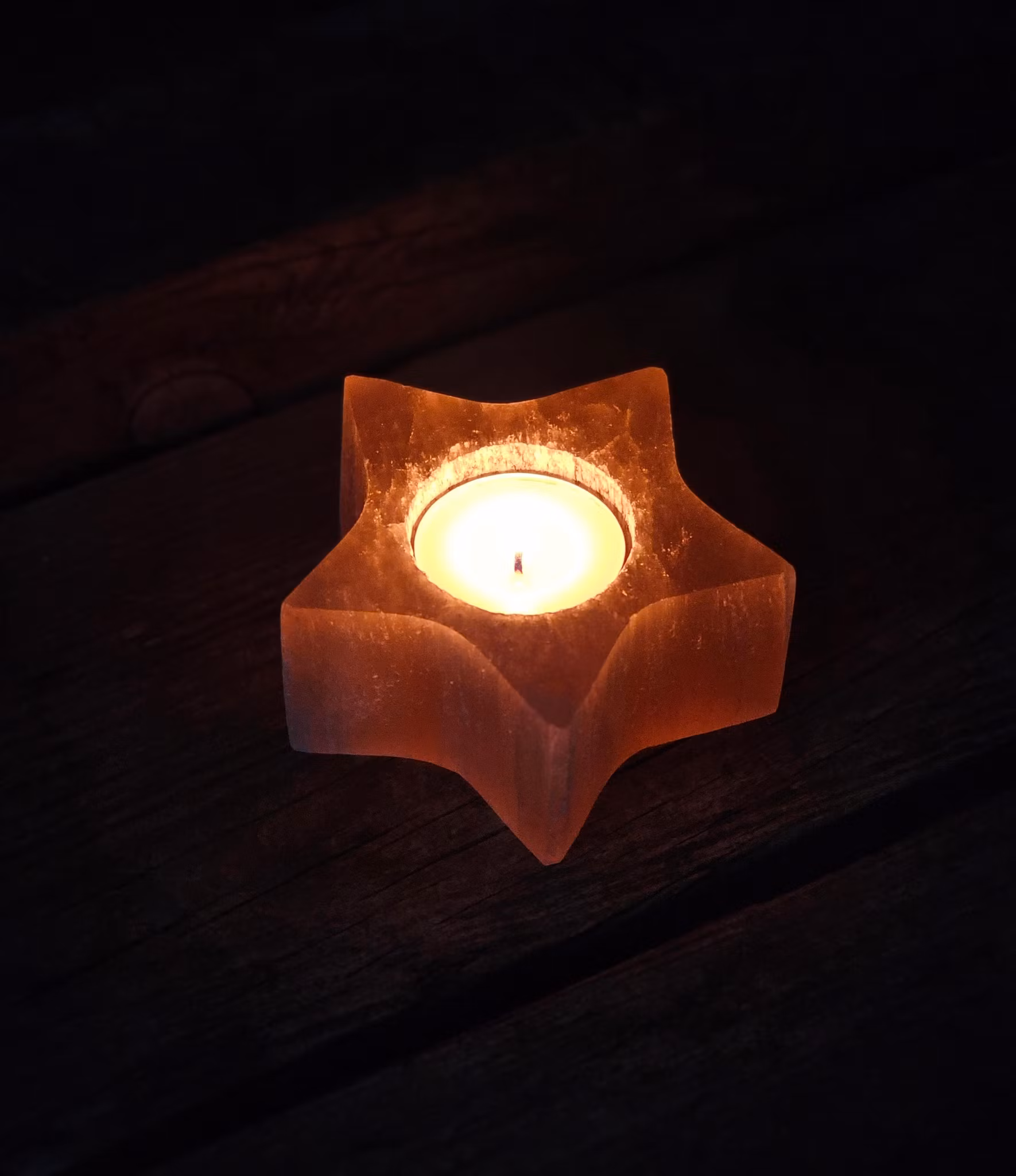 Orange Selenit, ljuslykta stjärna