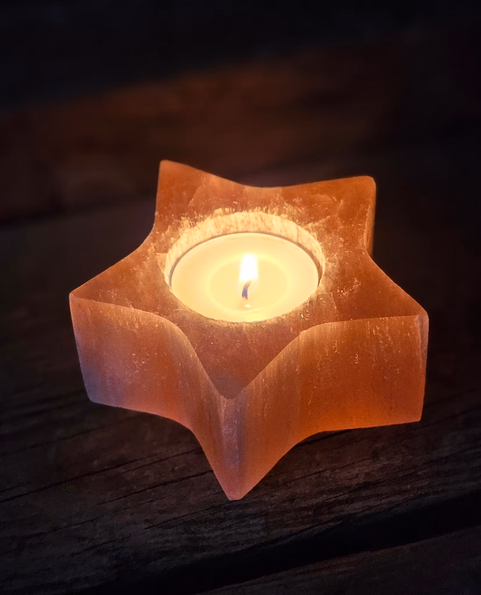 Orange Selenit, ljuslykta stjärna