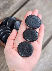 Svart Lavasten platta, touchstone