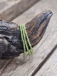 Peridot (Olivin), armband 4mm facetterade pärlor