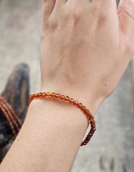 Spessartin Granat, armband 4mm facetterade pärlor